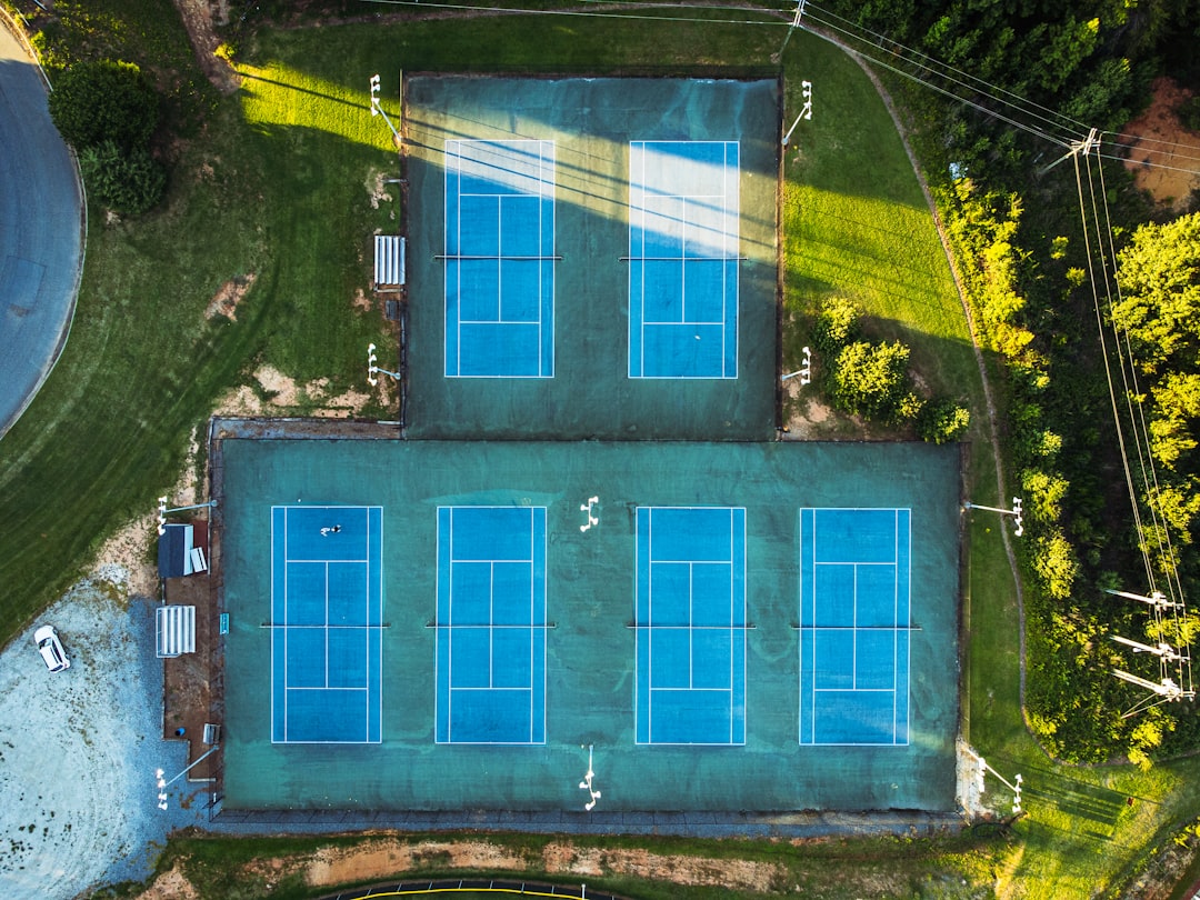 Aerial view of multiple tennis courts